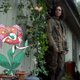 From left to right: Florges, a Pokémon resembling a humanoid bouquet of flowers, and Tessa Thompson as physicist Josie Radek in Annihilation.